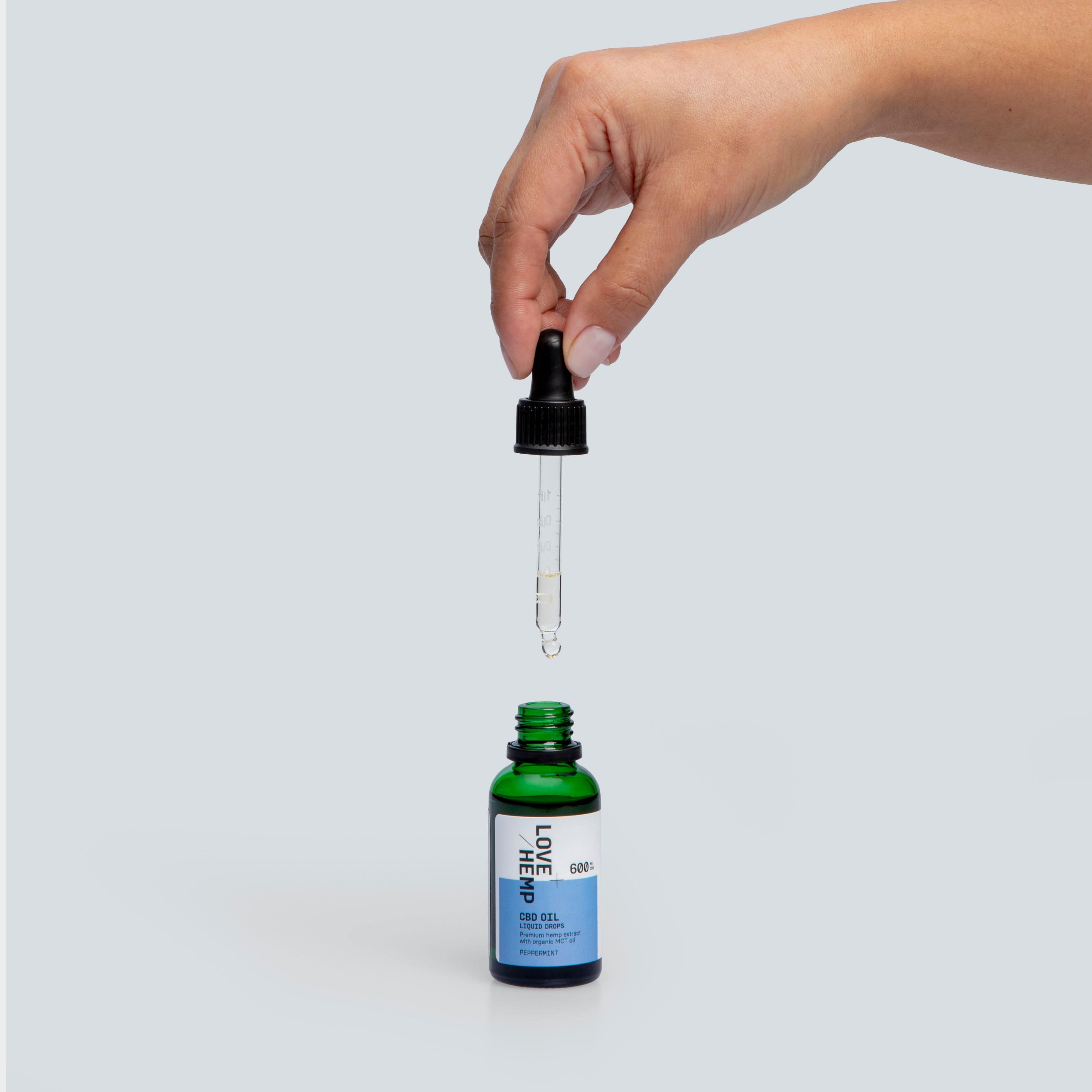 hand holding droplet CBD Oil Drops 600mg